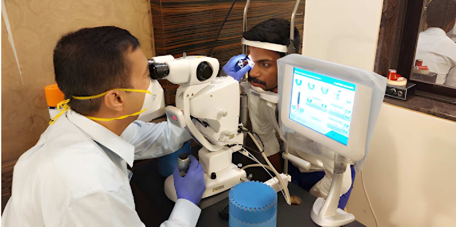 Dr. Sachin Tiwari conducting retinal laser / slit-lamp examination at Kalyan Eye & Retina Care Centre
